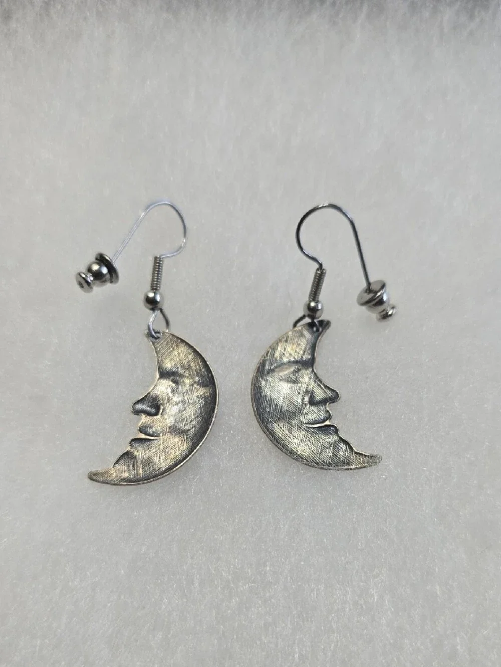 Silver Crescent Moon Face Dangle Earrings